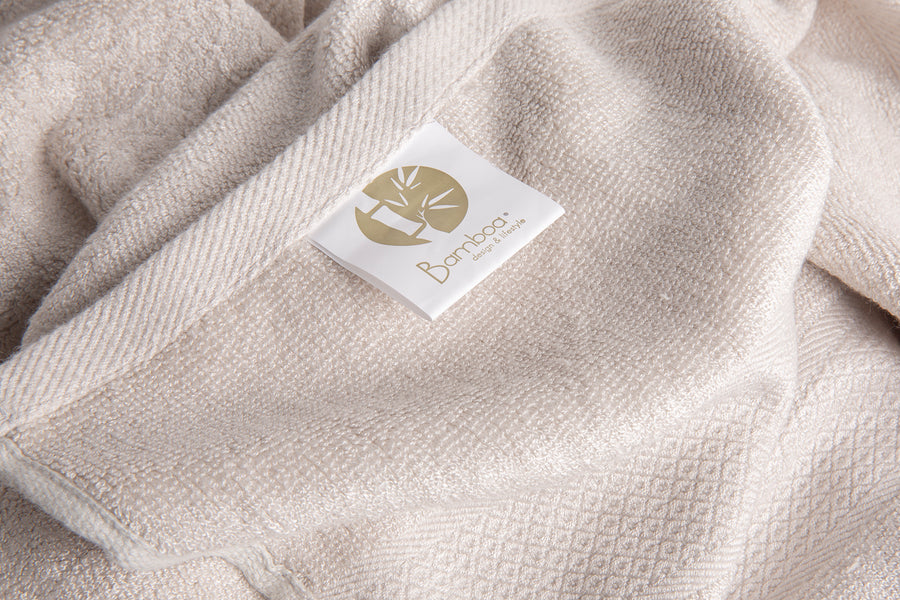Bamboa towels made of 100% bamboo for an eco-firendly and organic home. Available in cream color.